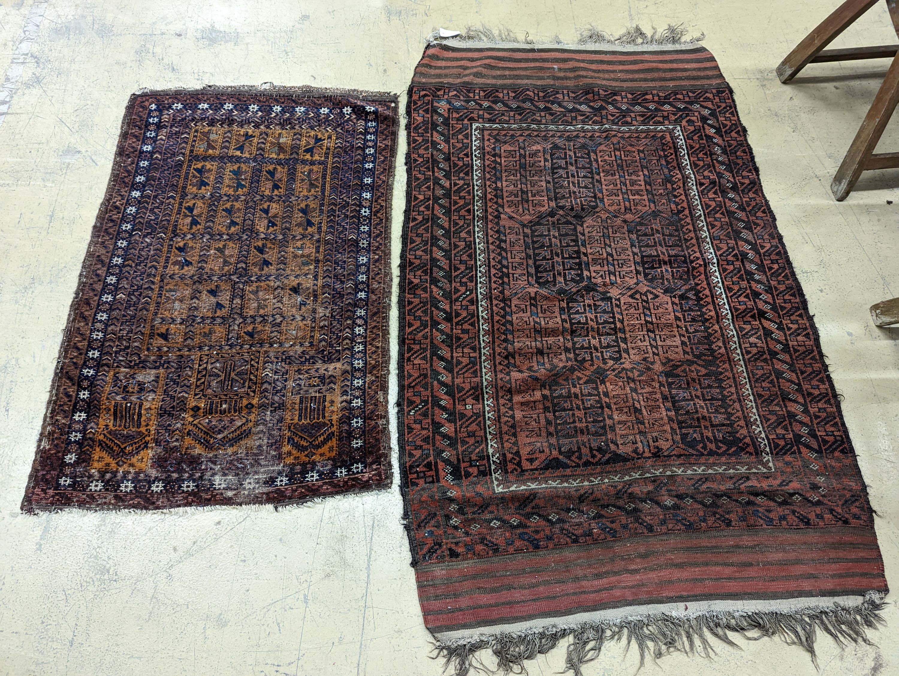 A Belouch red ground rug and a prayer rug, largest 178 x 106cm